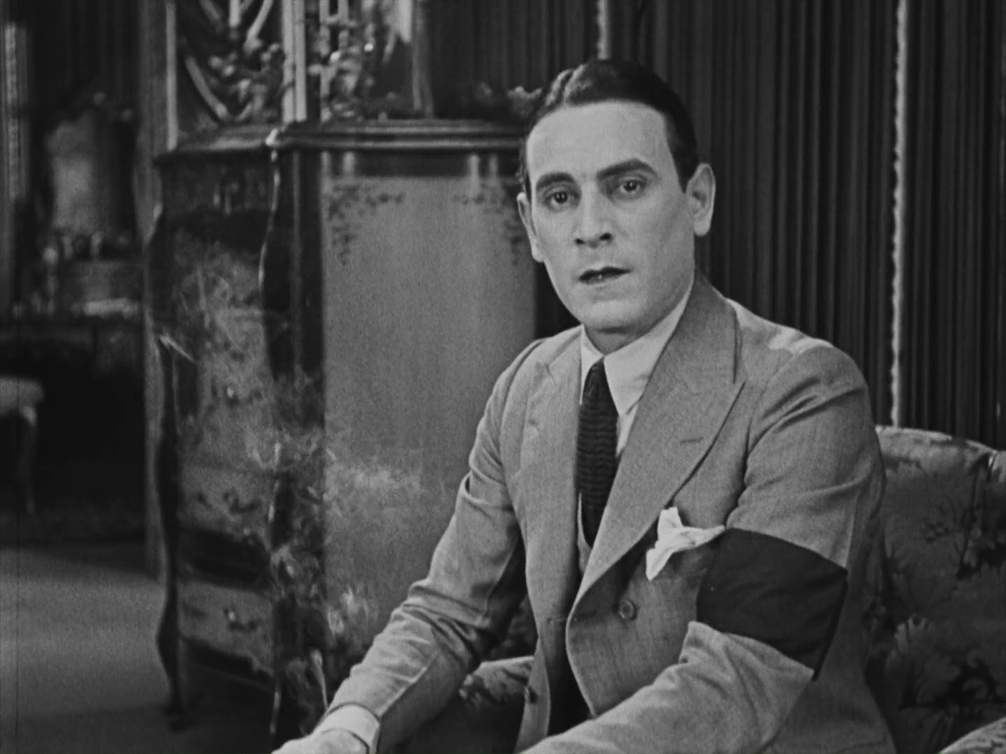 Carl Miller (Jean Millet) en 'Una mujer de París' (1923, Charles Chaplin)